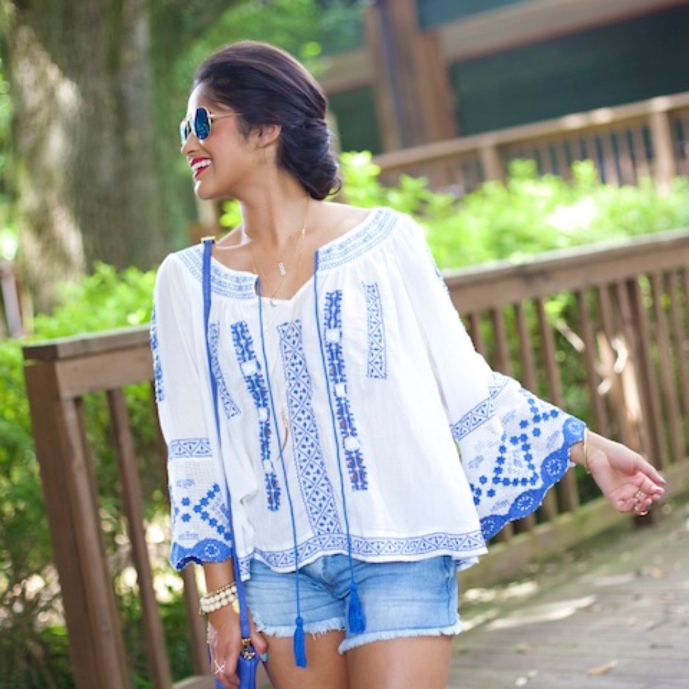 Beautiful rare top bohemian white and blue embroidered design. Can be worn off s